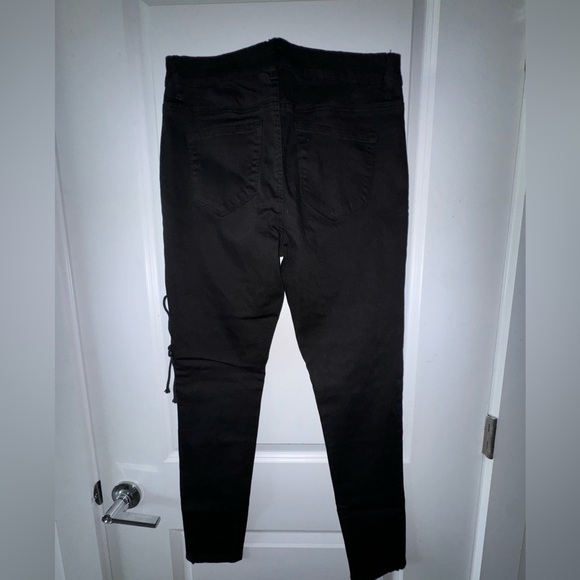 Fashion Nova, black denim, with lace up detail on thigh area. Size 11. - Picture 2 of 3